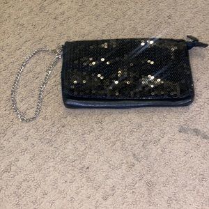 Black sequence and pleather wristlet